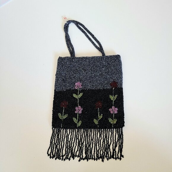 Black and silver beaded wrist bag with floral design and fringes. - Picture 2 of 6